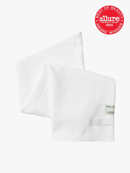 The Hair Towel in branded white color way on light gray background with red Allure Best of Beauty seal in the top right corner